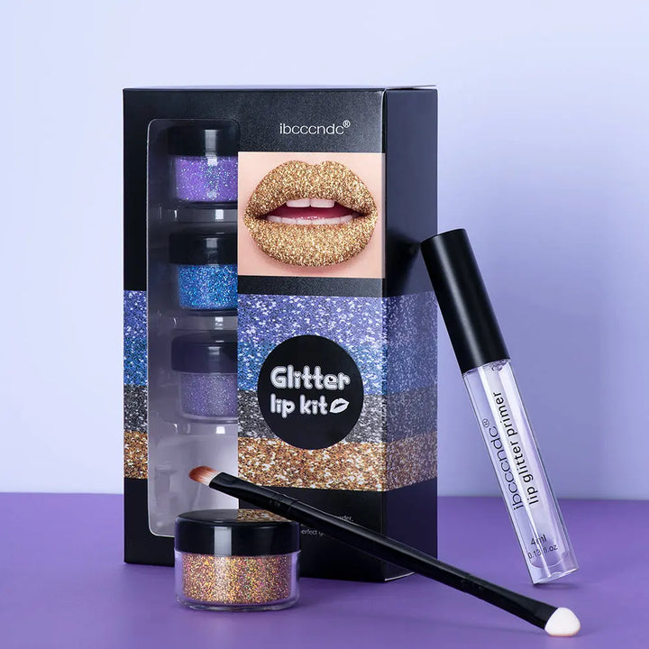 a box of glitter lip kits and a brush