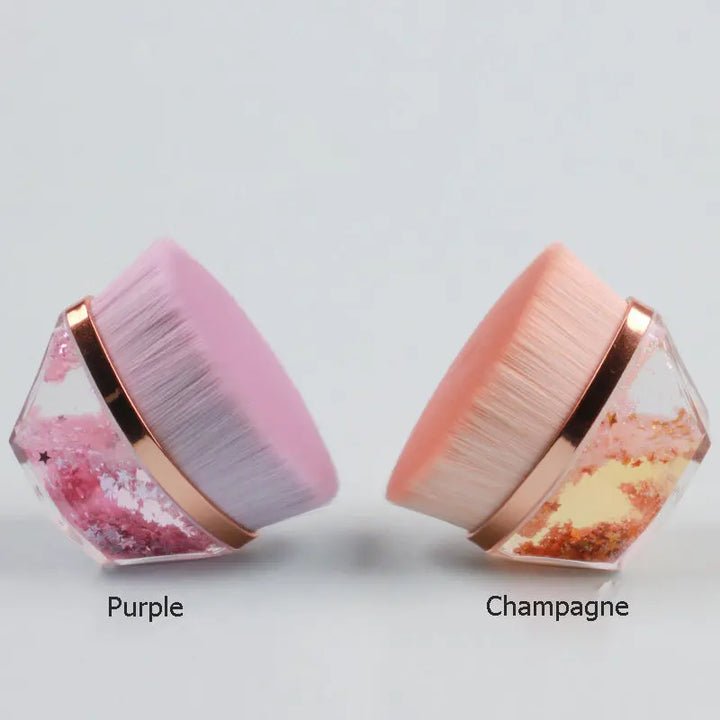 a couple of pink and gold rings sitting on top of each other